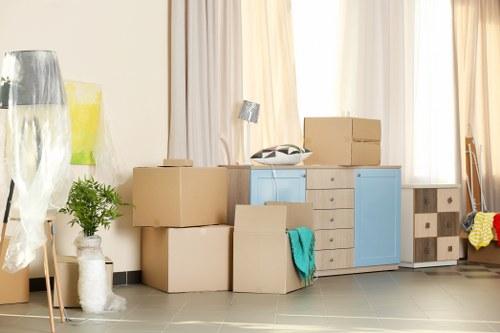 Professional house removals in Greenford with packed moving boxes