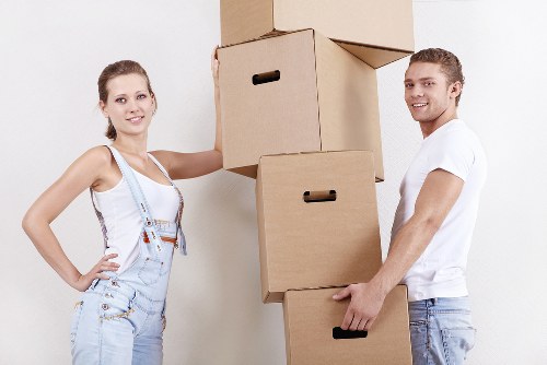 Professional man and van service in Greenford on a residential street