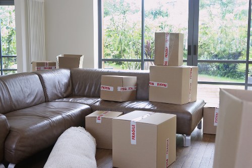 Organised boxes and furniture stored safely in a Greenford unit