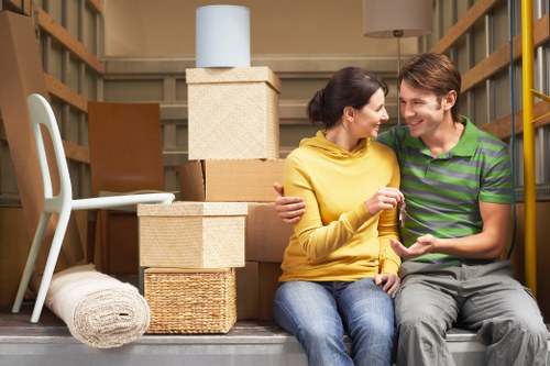 Efficient Greenford office relocation with organised workstations and moving boxes
